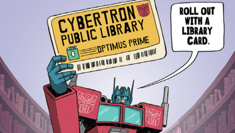Cartoon character Optimus Prime holds a 金刚体育官网官方入口网址 Library card from Cybertron Public Library. A speech bubble says: Roll out with a 金刚体育官网官方入口网址 Library card.
